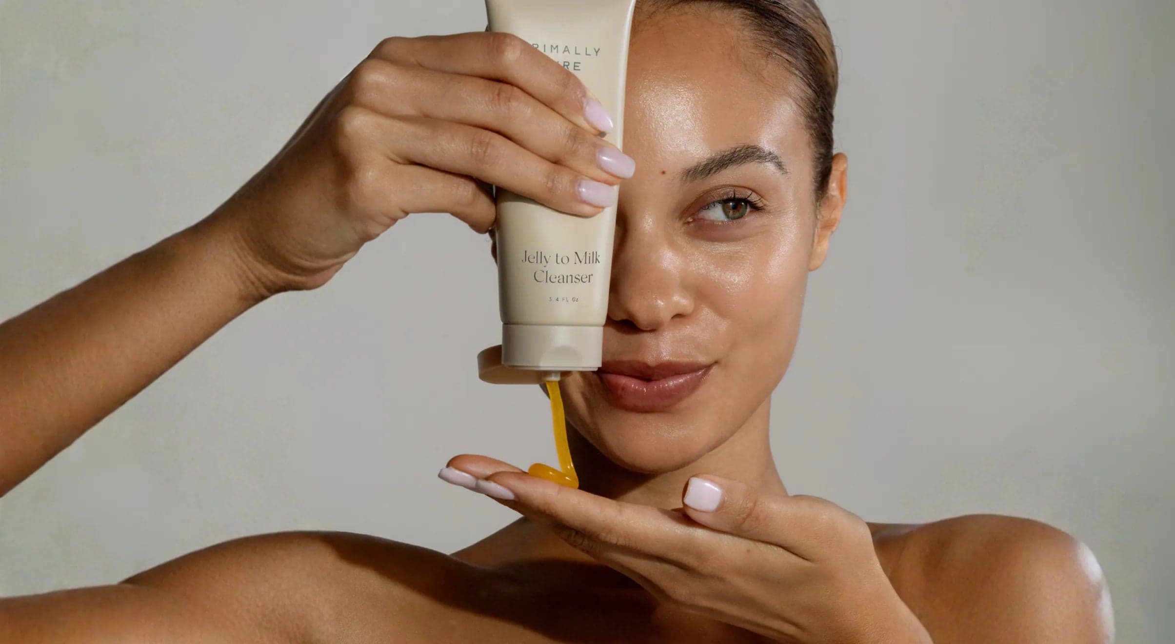 A skincare ritual laid out on a stone surface